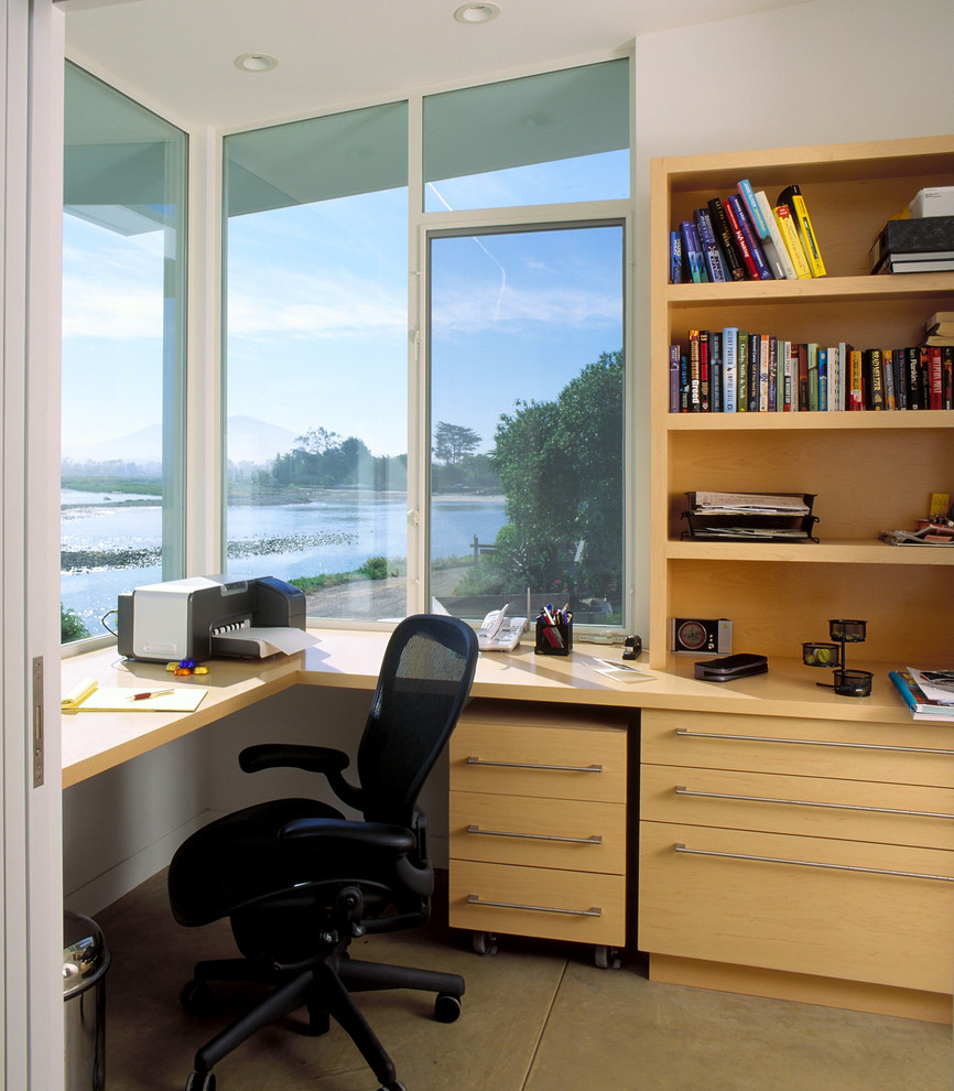 Inspiration for a nautical home office in Santa Barbara with a built-in desk.