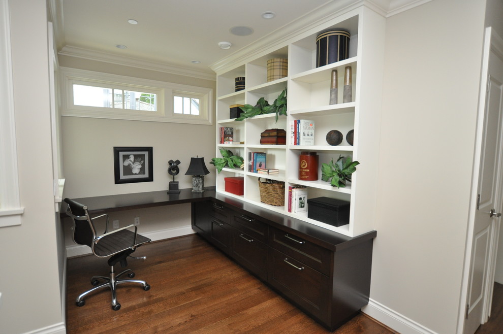 Inspiration for a traditional home office in Vancouver with a built-in desk.