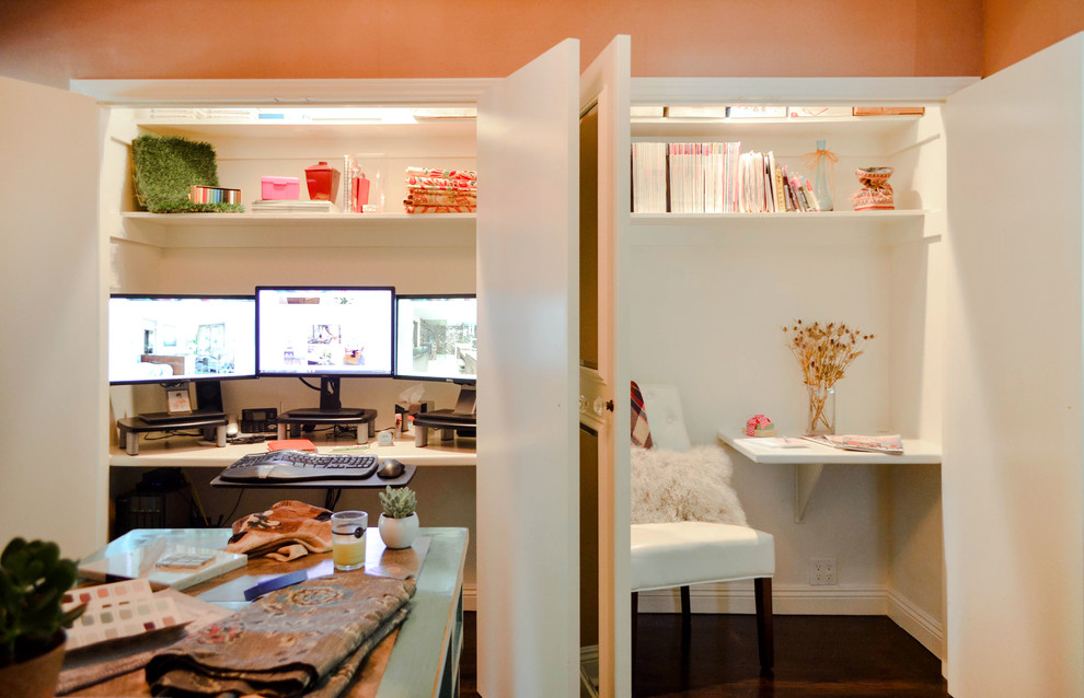 Study room - mid-sized built-in desk dark wood floor and brown floor study room idea in Los Angeles with white walls and no fireplace