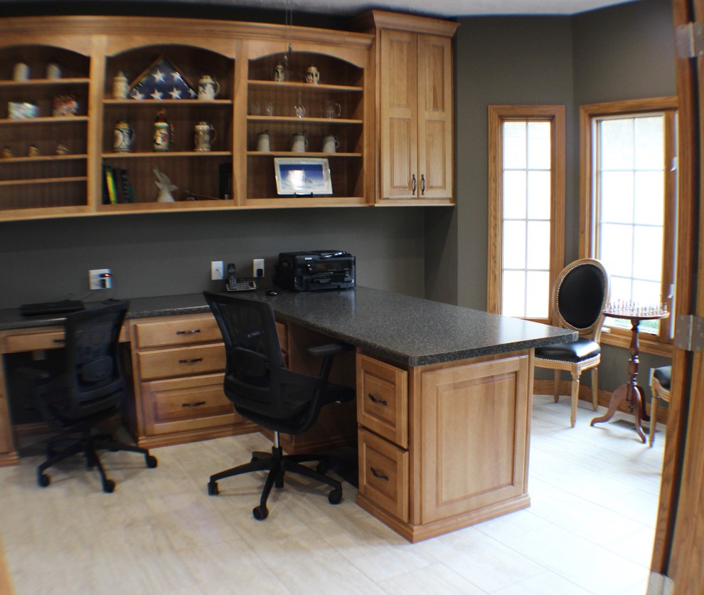 Photo of a medium sized traditional study in Chicago with ceramic flooring and a built-in desk.