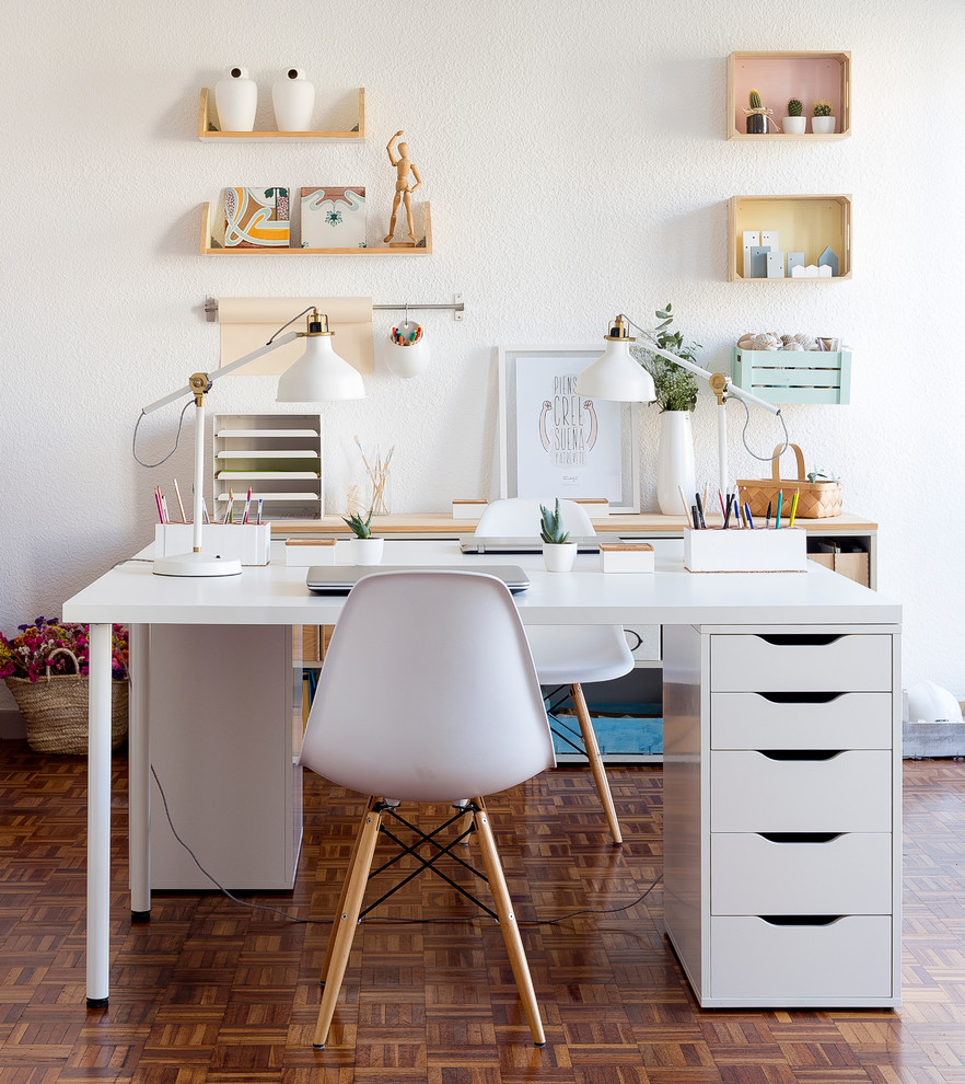 Mid-sized trendy freestanding desk dark wood floor study room photo in Valencia with white walls and no fireplace