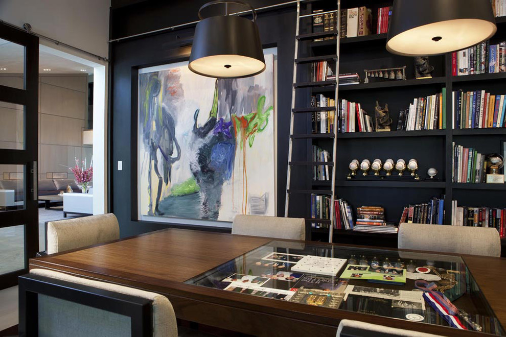 Design ideas for a contemporary home office in Miami with black walls.