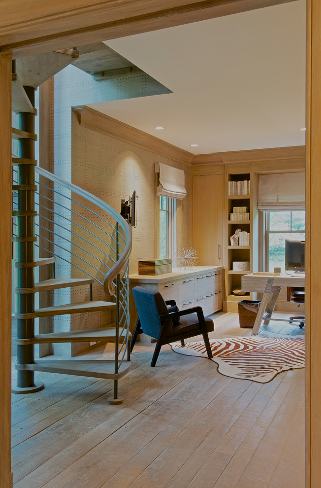 Photo of a medium sized victorian home office in New York with a freestanding desk and light hardwood flooring.