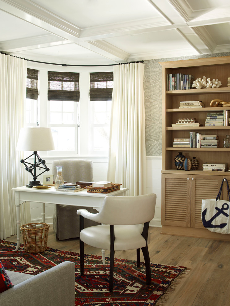 Example of a beach style freestanding desk study room design in San Diego