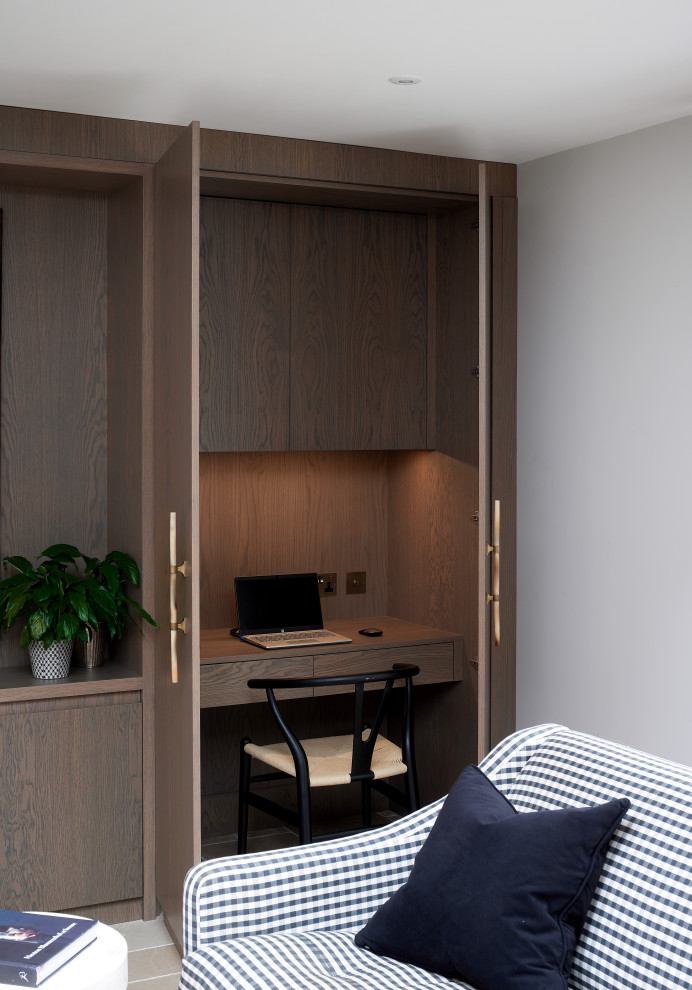 Example of a large trendy home office design in Wiltshire