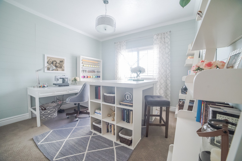 Mid-sized transitional freestanding desk carpeted craft room photo in Salt Lake City with blue walls