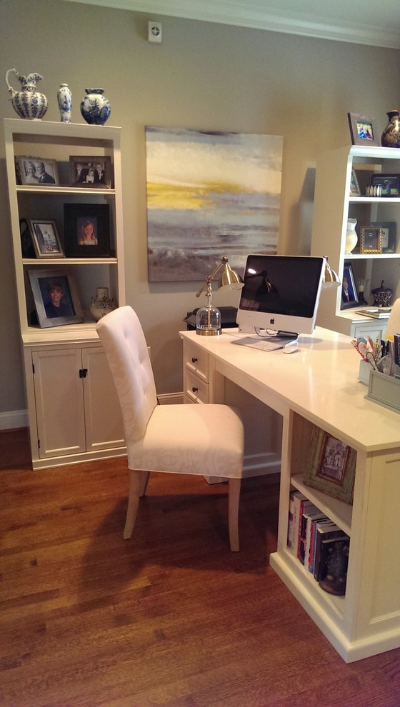 Medium sized classic home office in Atlanta with beige walls, medium hardwood flooring and a freestanding desk.