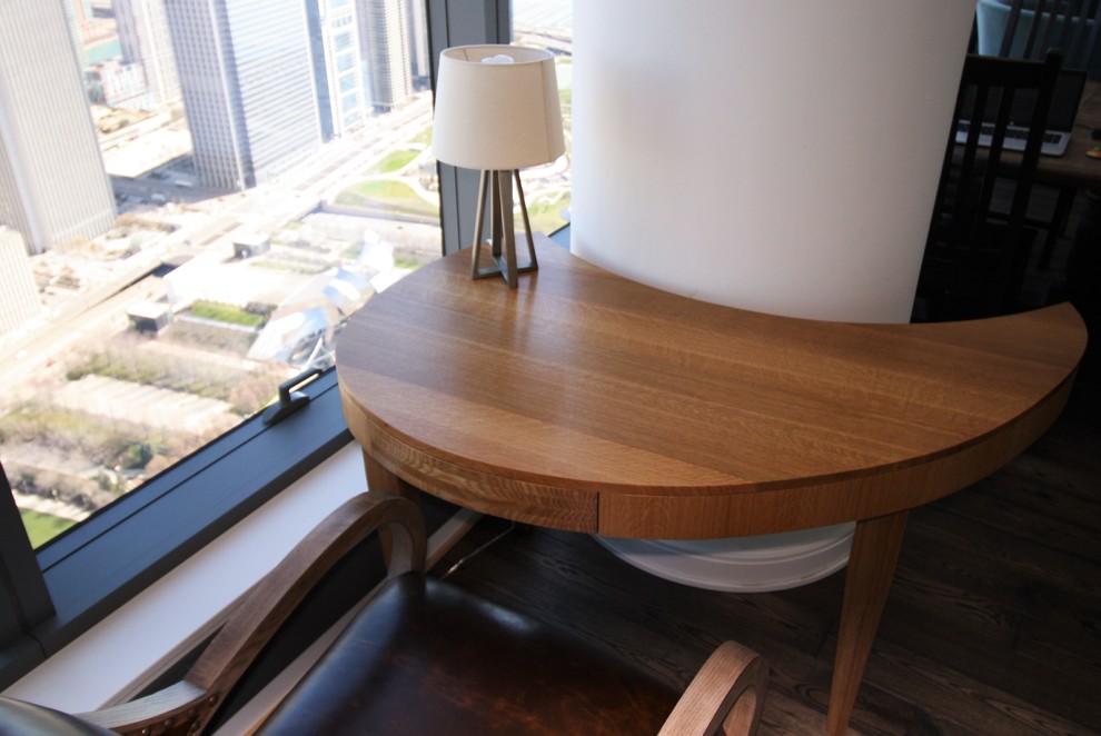 Example of a mid-sized transitional freestanding desk home office design in Chicago