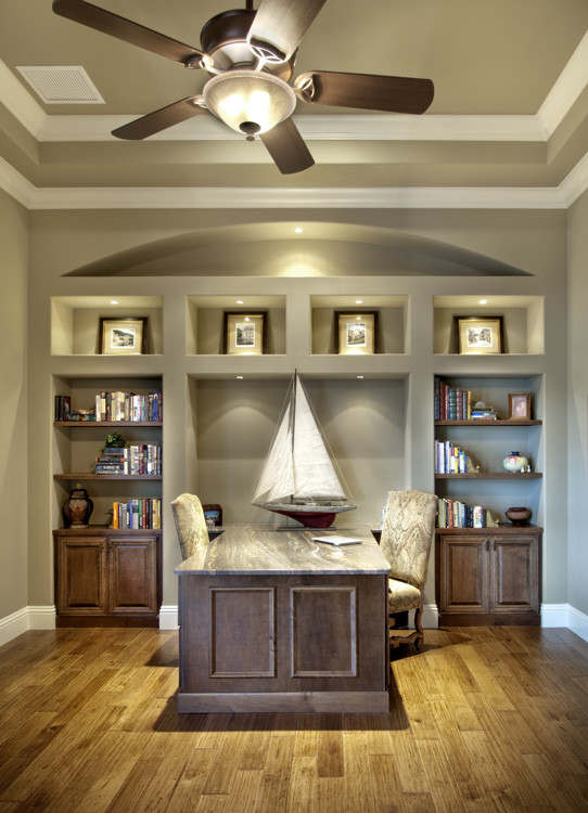 Inspiration for a classic study in Miami with medium hardwood flooring and a built-in desk.
