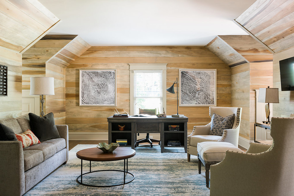 This is an example of a coastal study in Atlanta with beige walls, dark hardwood flooring, no fireplace and a freestanding desk.