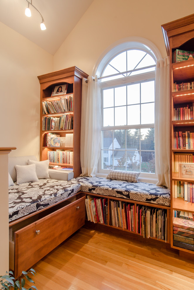 Arts and crafts home office library photo in Boston with yellow walls and no fireplace