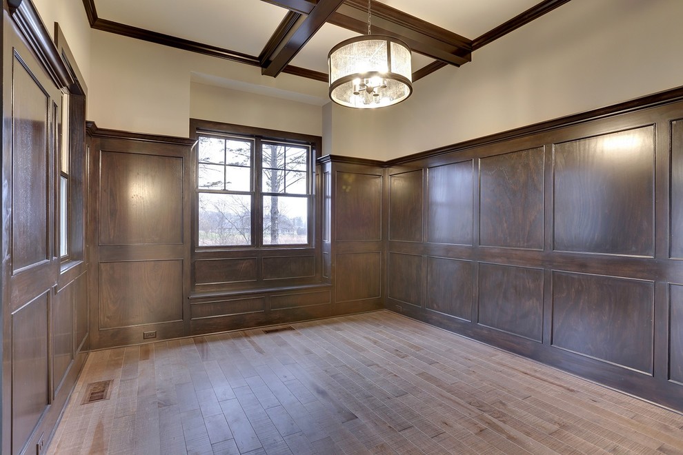 Example of a transitional home office design in Minneapolis