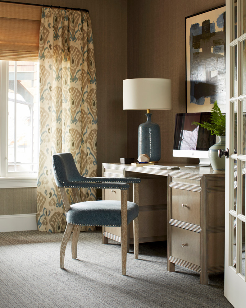 Example of a trendy home office design in Boston