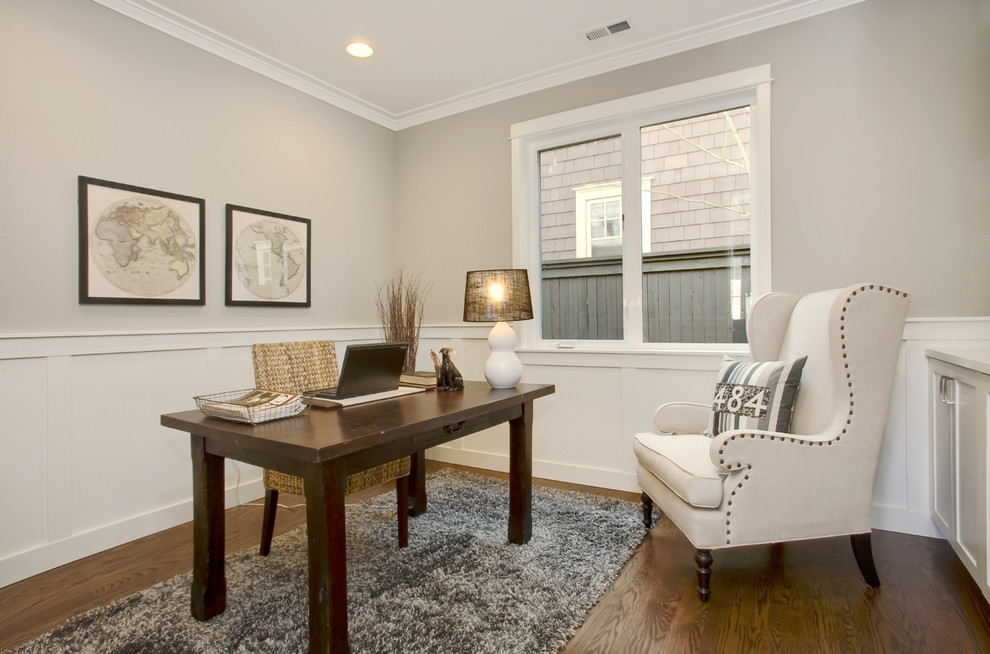 Traditional study in Seattle with grey walls, medium hardwood flooring and a dado rail.