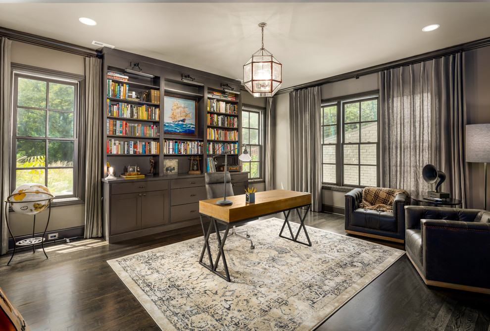 Design ideas for a large traditional study in Nashville with grey walls, dark hardwood flooring, a freestanding desk and brown floors.