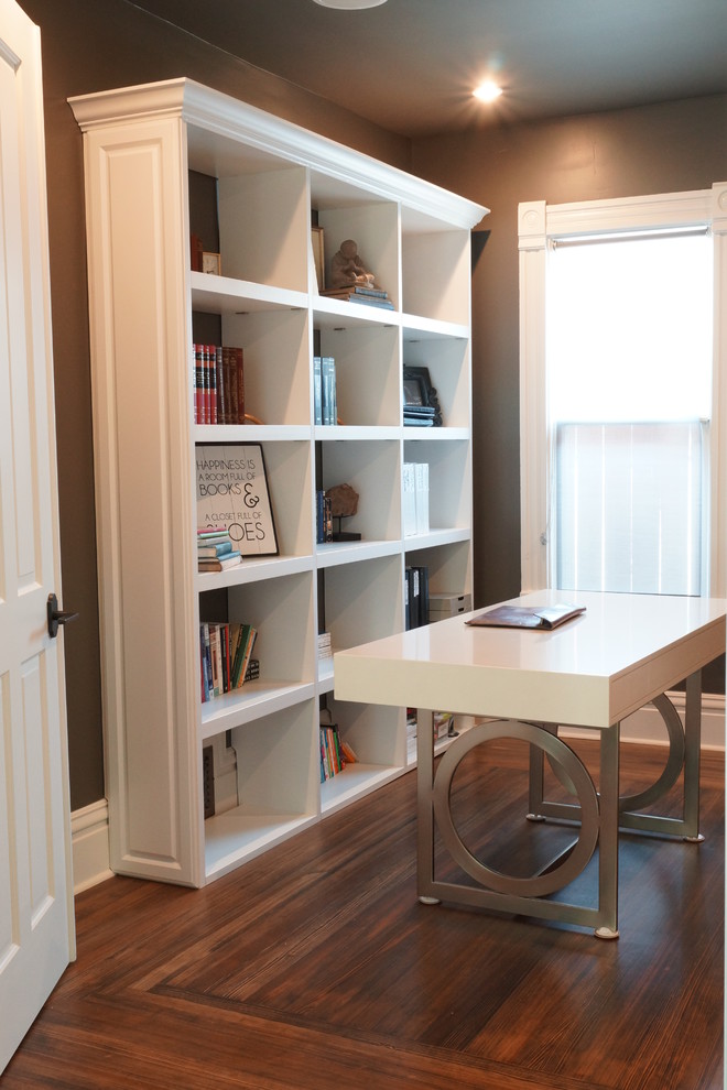 Medium sized classic home office in Denver with grey walls and dark hardwood flooring.