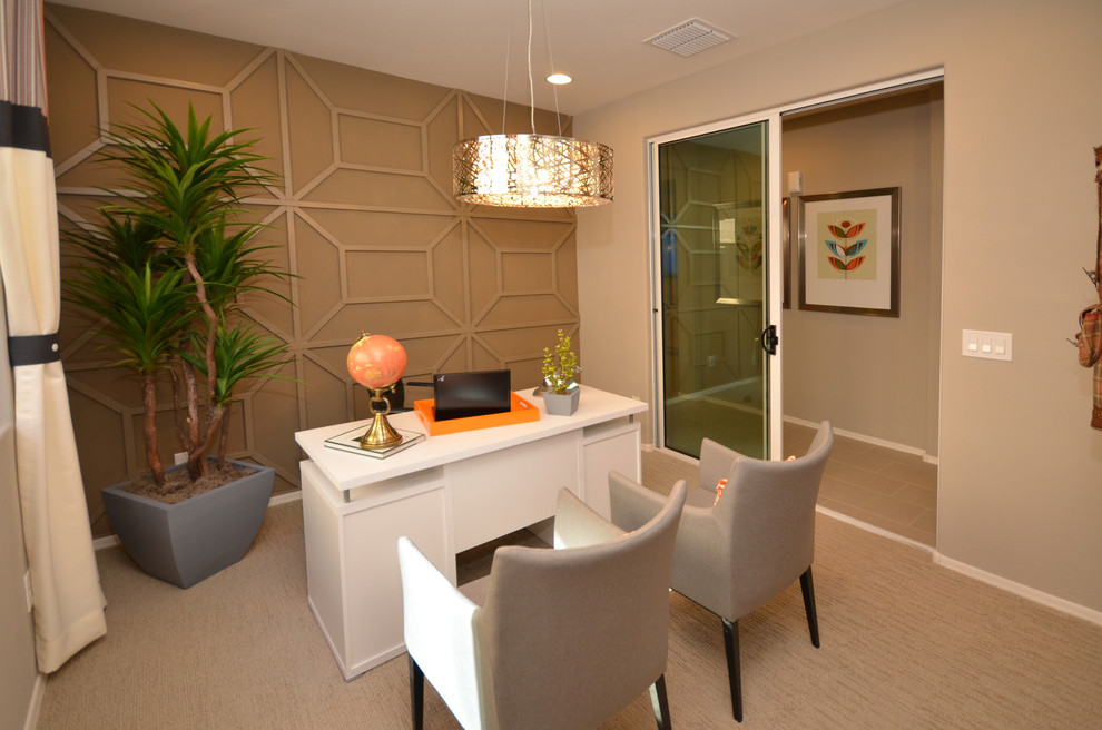 Photo of a medium sized contemporary study in Phoenix with beige walls, carpet and a freestanding desk.