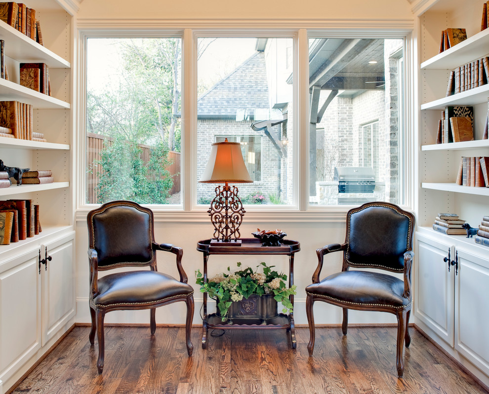 Example of a small eclectic dark wood floor study room design in Dallas with white walls