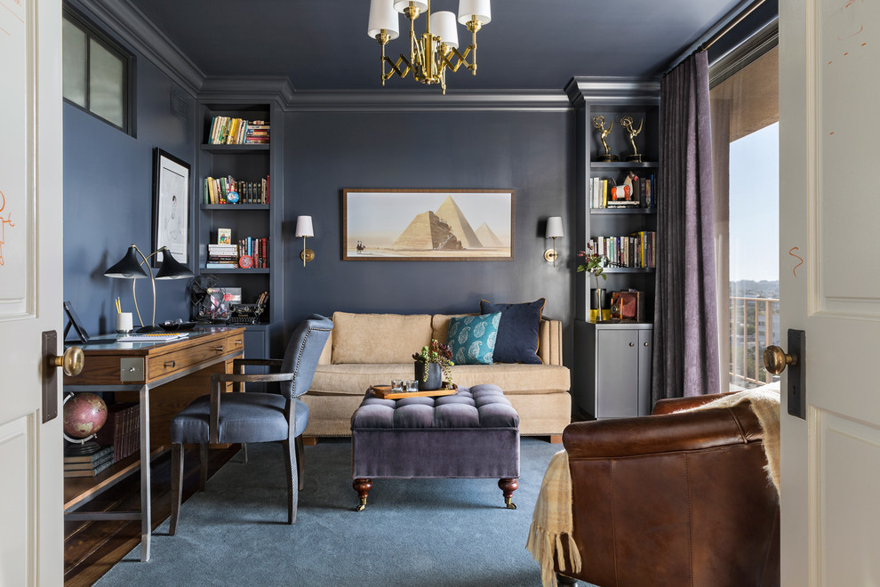 Example of a small transitional freestanding desk dark wood floor home office design in Los Angeles with blue walls