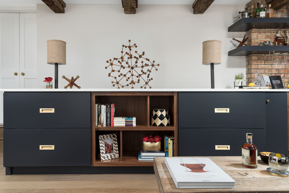 Photo of a medium sized midcentury study in Chicago with beige walls, medium hardwood flooring, no fireplace, a freestanding desk and brown floors.