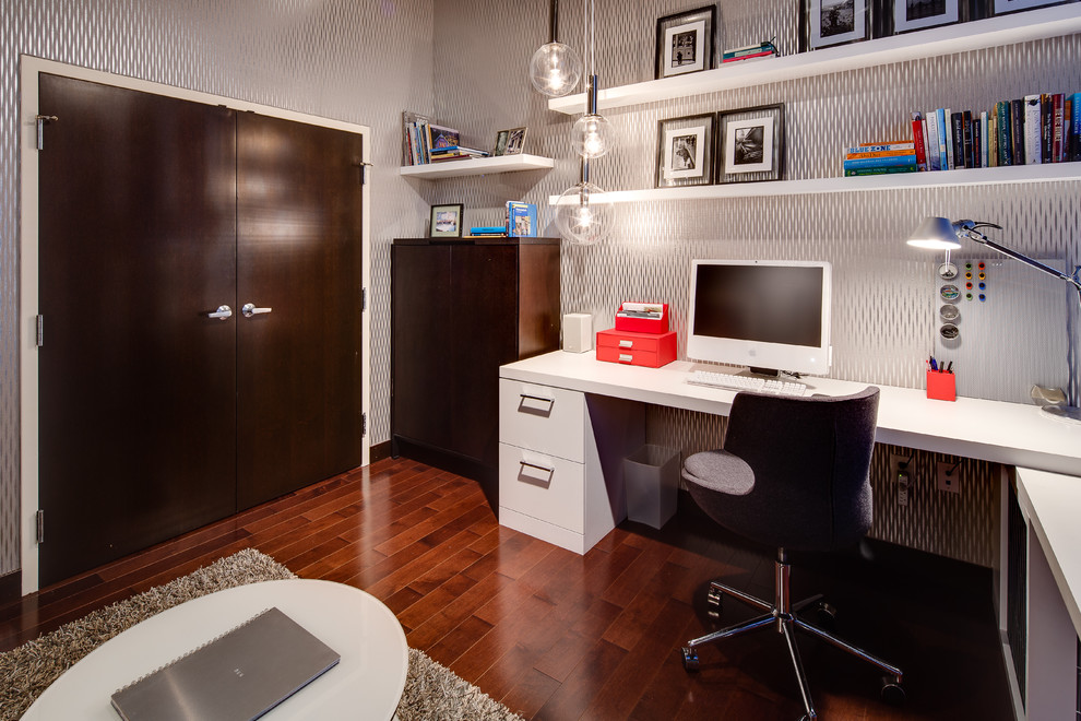 Inspiration for an urban home office in Minneapolis with dark hardwood flooring and a built-in desk.