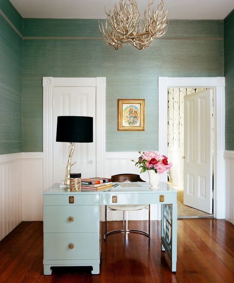 Example of an eclectic freestanding desk dark wood floor home office design in Other with green walls