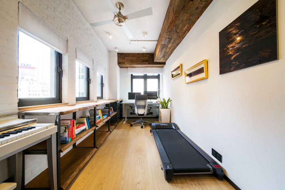 Example of a trendy home office design in Hong Kong