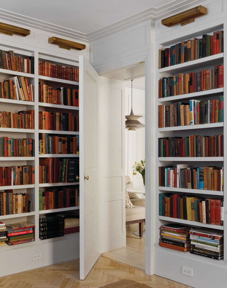 Inspiration for a transitional light wood floor home office remodel in New York