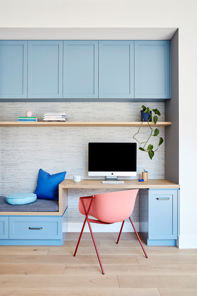 Example of a trendy home office design in Melbourne