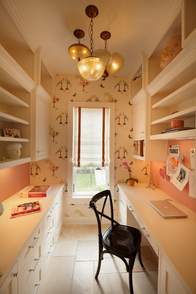 Example of a classic built-in desk beige floor home office design in Minneapolis