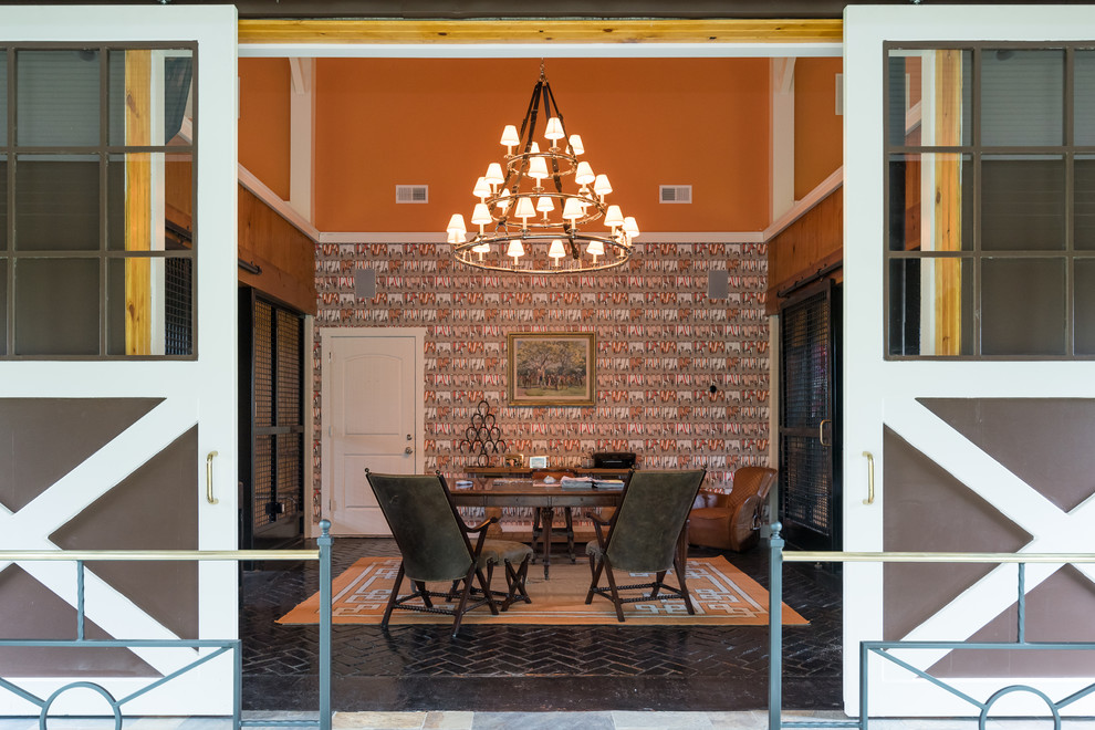 Inspiration for a farmhouse brick floor home office remodel in Louisville with orange walls