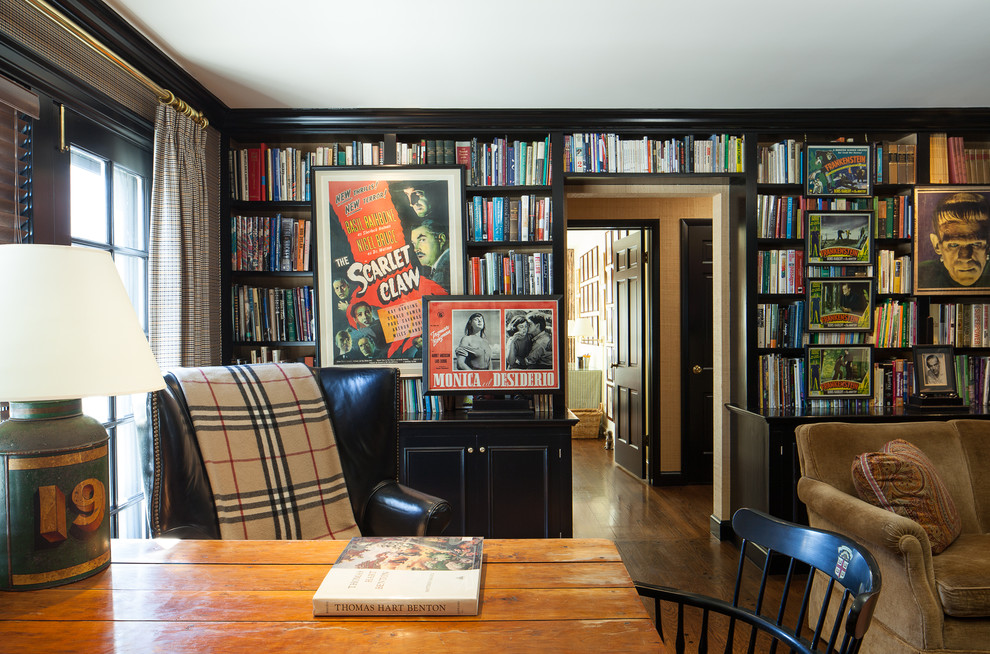 Inspiration for a traditional study in Chicago with dark hardwood flooring and a freestanding desk.