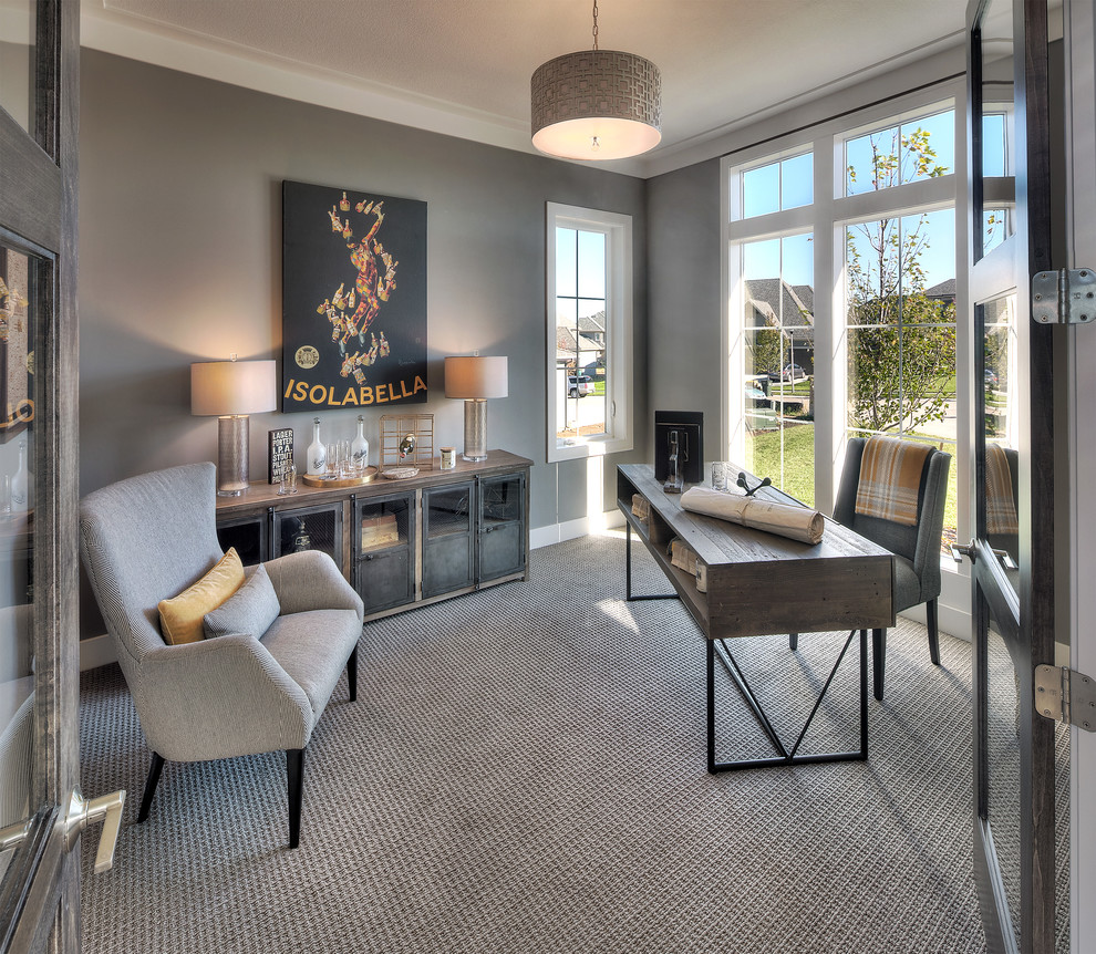 Large transitional freestanding desk carpeted study room photo in Kansas City with gray walls and no fireplace