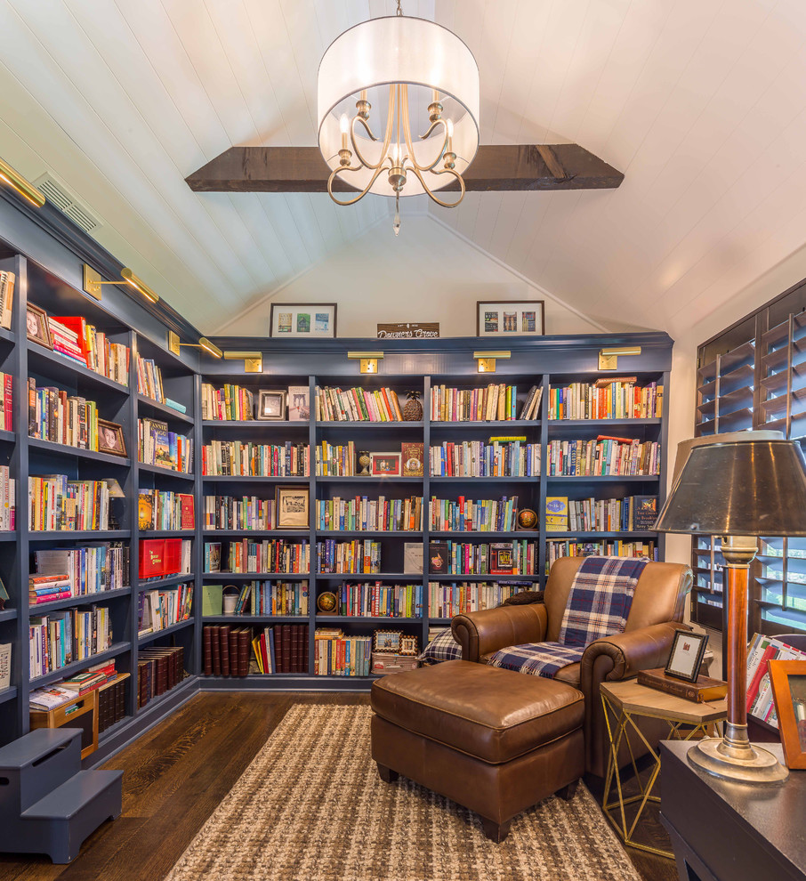 Medium sized classic home office in Chicago with a reading nook, white walls, dark hardwood flooring, a freestanding desk, brown floors, no fireplace, exposed beams, feature lighting, a brick fireplace surround and wallpapered walls.