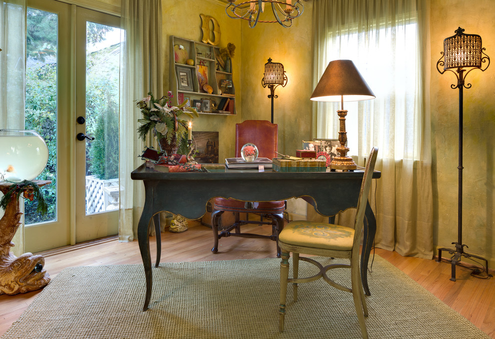 Example of a tuscan home office design in Portland