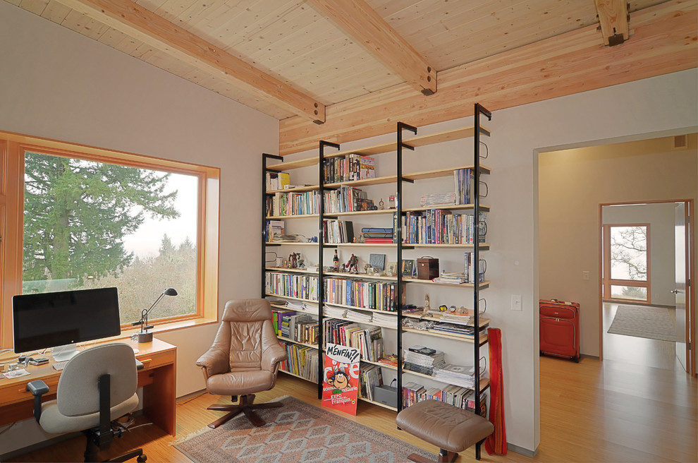 Photo of a contemporary home office in Portland with white walls.