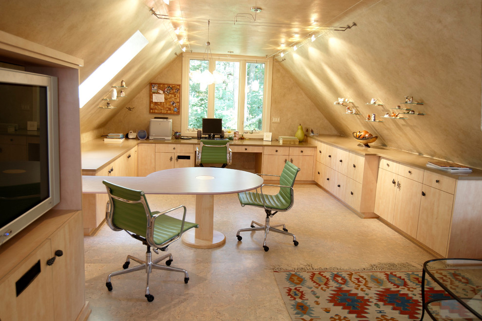 Inspiration for a contemporary built-in desk beige floor home office remodel in Minneapolis with beige walls