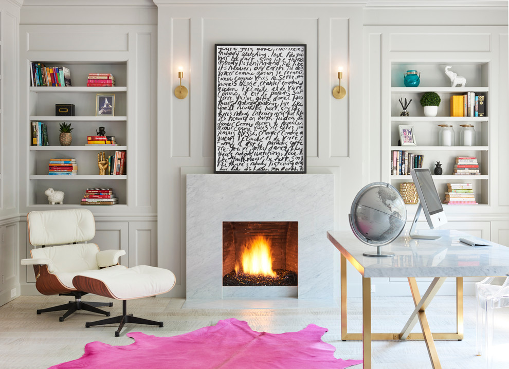 トロントにある高級な広いトランジショナルスタイルのおしゃれな書斎 (白い壁、標準型暖炉、自立型机、淡色無垢フローリング、石材の暖炉まわり) の写真