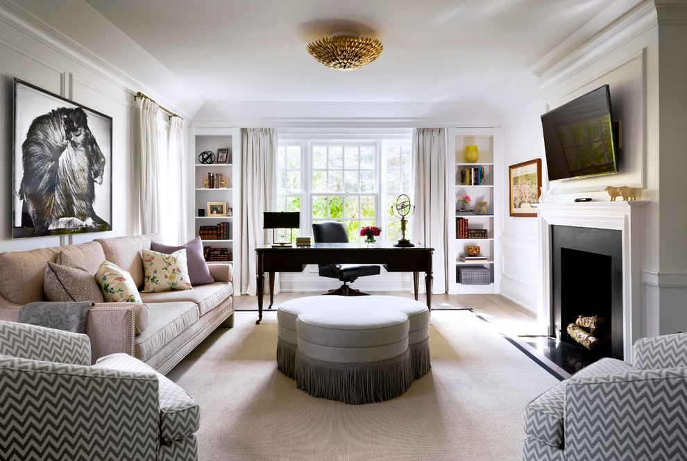 Inspiration for a large classic study in Toronto with white walls, dark hardwood flooring, a standard fireplace, a stone fireplace surround, a freestanding desk and brown floors.