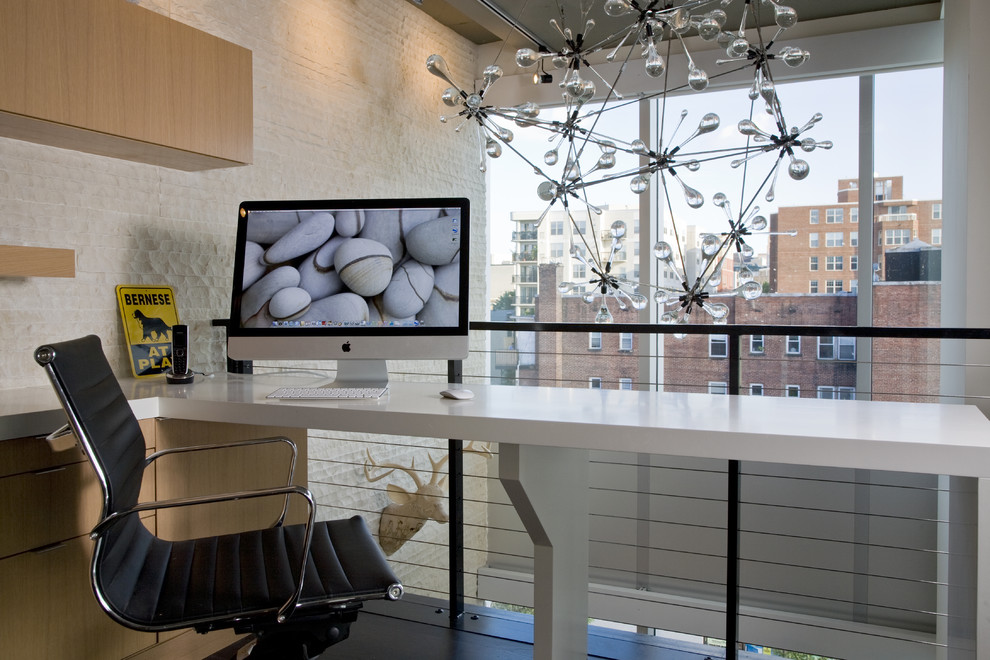 Home office - contemporary built-in desk dark wood floor home office idea in DC Metro