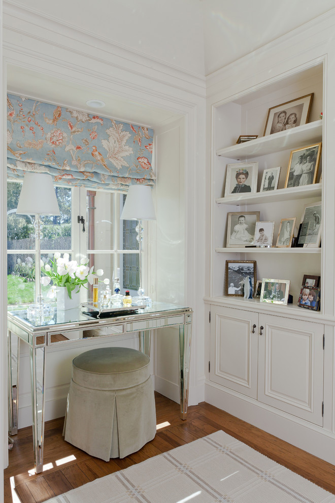 Inspiration for a contemporary freestanding desk medium tone wood floor home office remodel in San Francisco with white walls