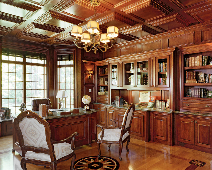 Example of a huge tuscan freestanding desk study room design in Boston