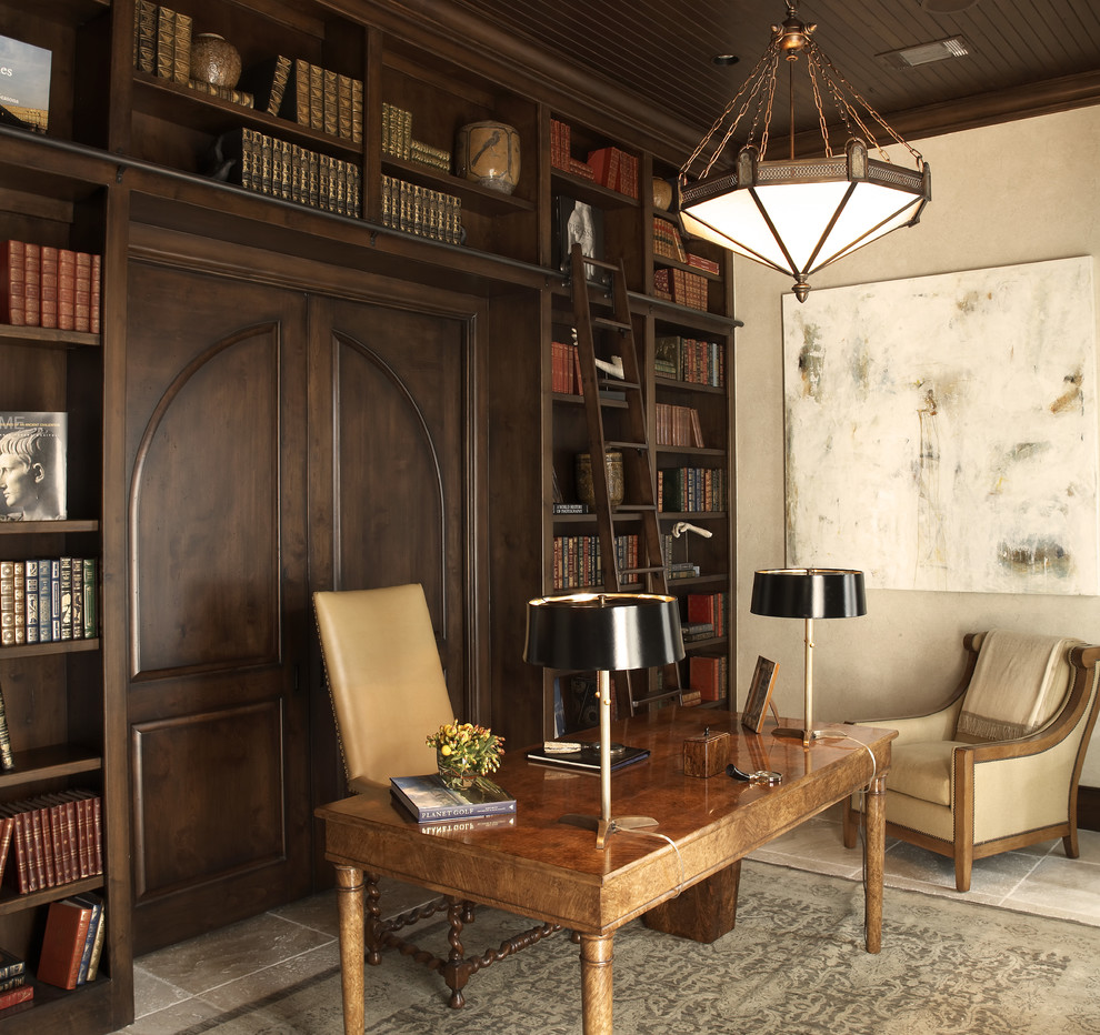 Example of a tuscan home office design in Houston