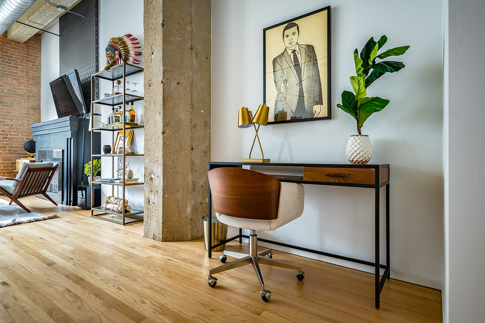 Inspiration for an industrial home office remodel in Chicago