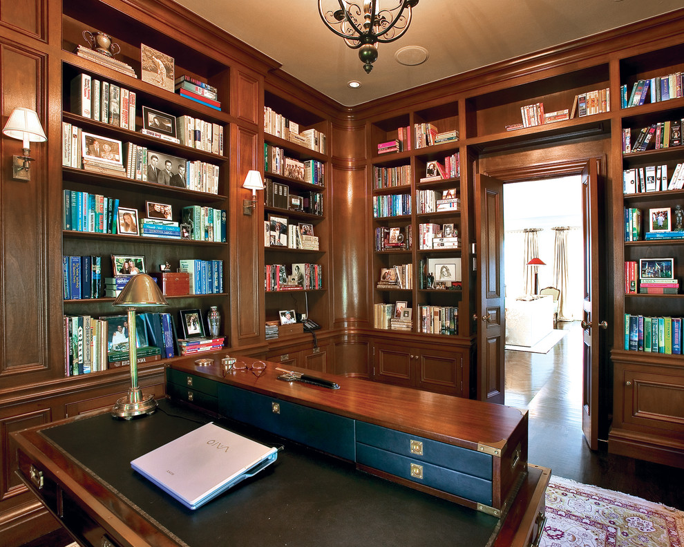 Study room - mid-sized traditional freestanding desk dark wood floor study room idea in New York with brown walls and no fireplace