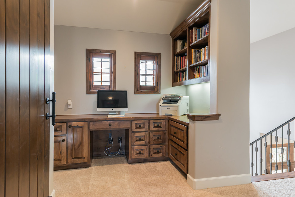 Small transitional built-in desk study room photo in Austin
