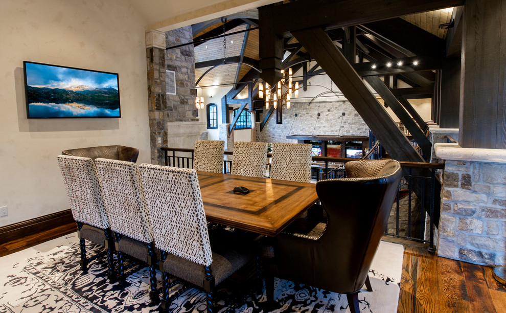 Inspiration for a large rustic freestanding desk medium tone wood floor study room remodel in Denver
