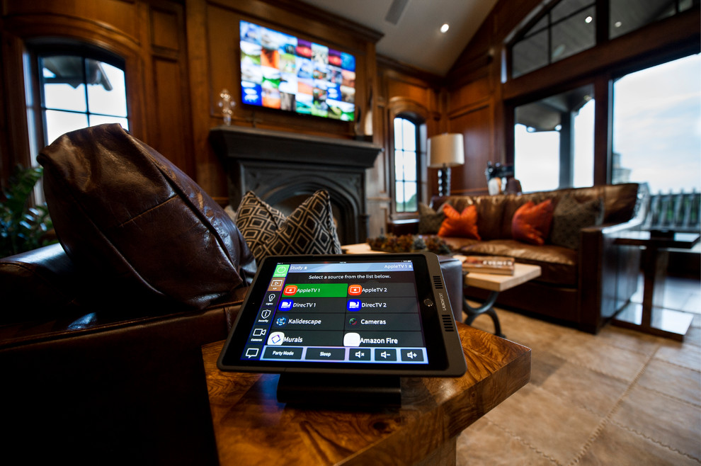 Example of a large mountain style freestanding desk medium tone wood floor study room design in Denver