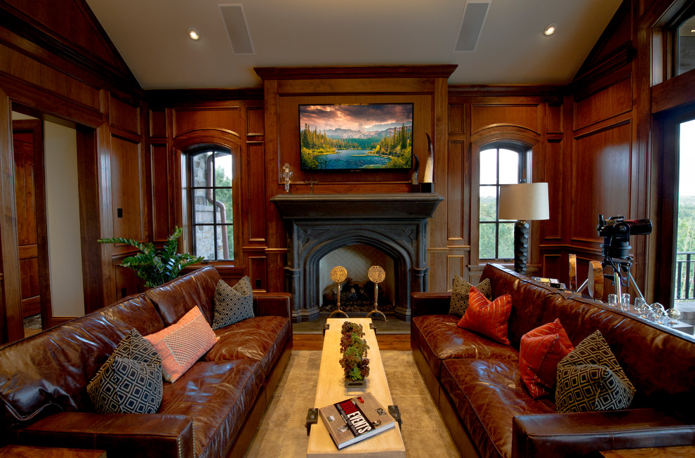 Study room - large rustic freestanding desk medium tone wood floor study room idea in Denver