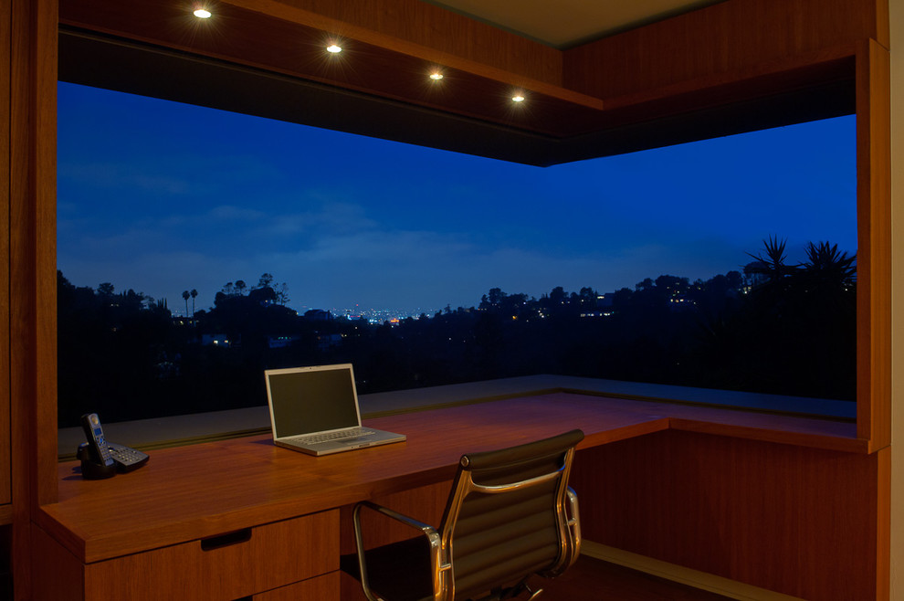 Home office - modern built-in desk home office idea in Los Angeles